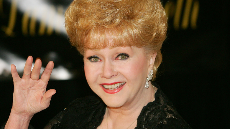 Debbie Reynolds waving hand