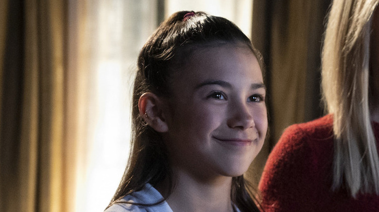 Scarlett Estevez smiling as Trixie Espinoza in Lucifer