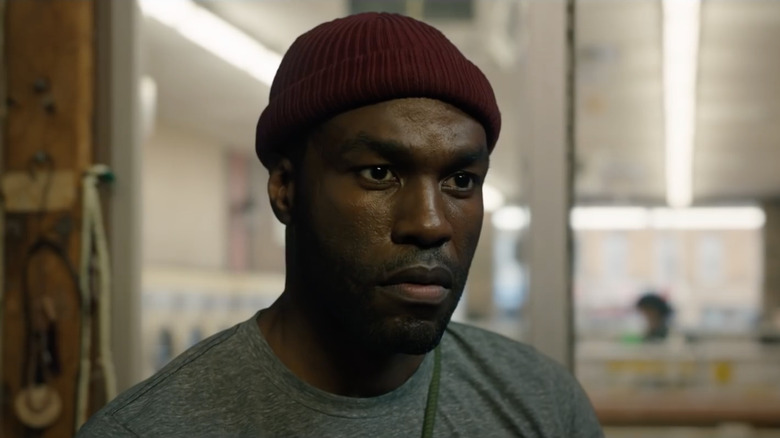 Yahya Abdul-Mateen II wearing red beanie