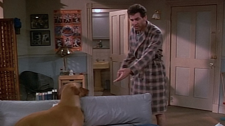 Kramer pointing at his dog