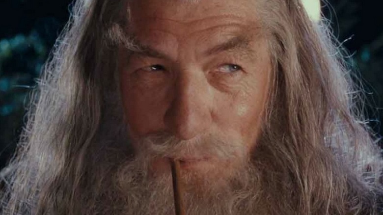 Gandalf smoking and smirking