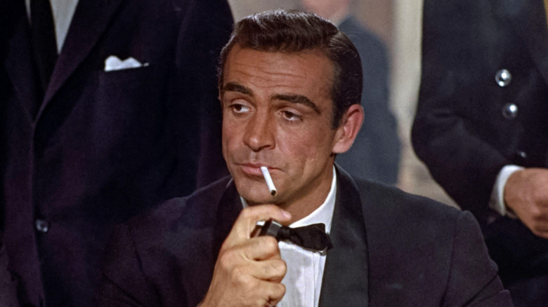 Sean Connery smokes as James Bond