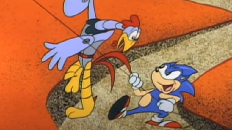 Sonic holds a rope and outsmarts one of Dr. Robotnik's henchmen 