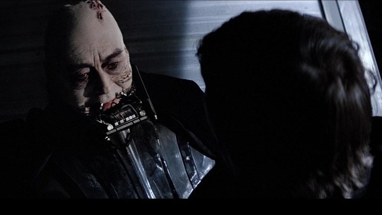 Luke removing Darth Vader's mask