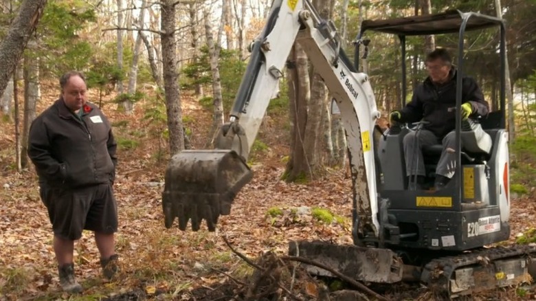 Marty Lagina, Billy, backhoe