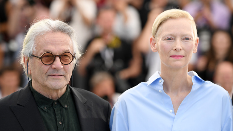 George Miller and Tilda Swinton standing