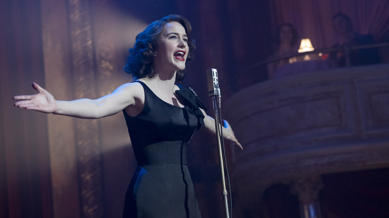 Miriam Maisel performing stand-up comedy