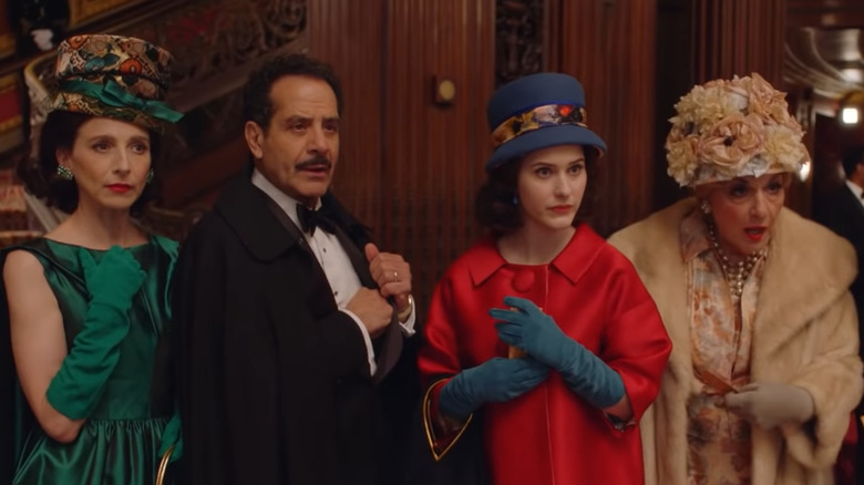 Marin Hinkle, Tony Shalhoub, Rachel Brosnahan, Caroline Aaron stand