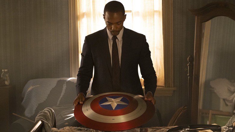 Sam holding Captain America's shield