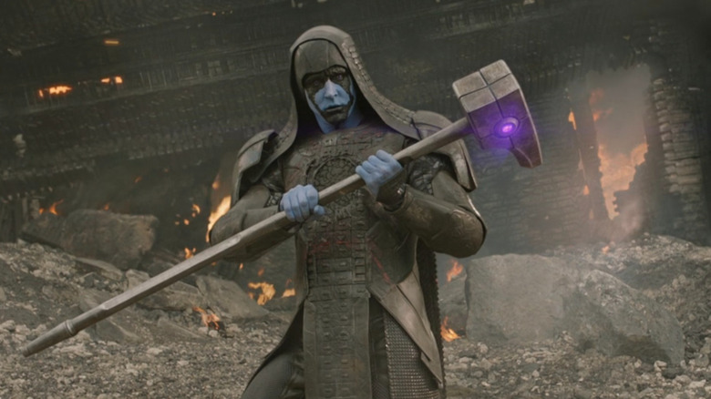 Ronan holding universal weapon