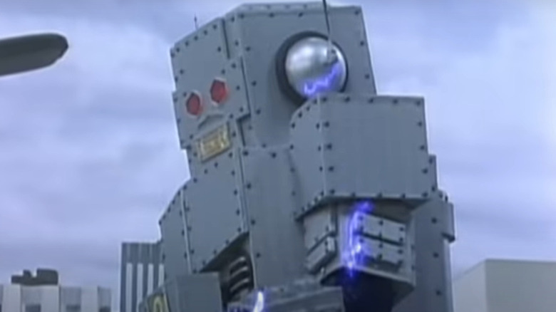 Giant robot walking through town