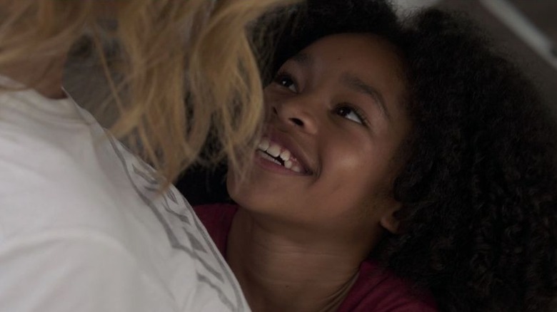 Young Monica Rambeau smiling