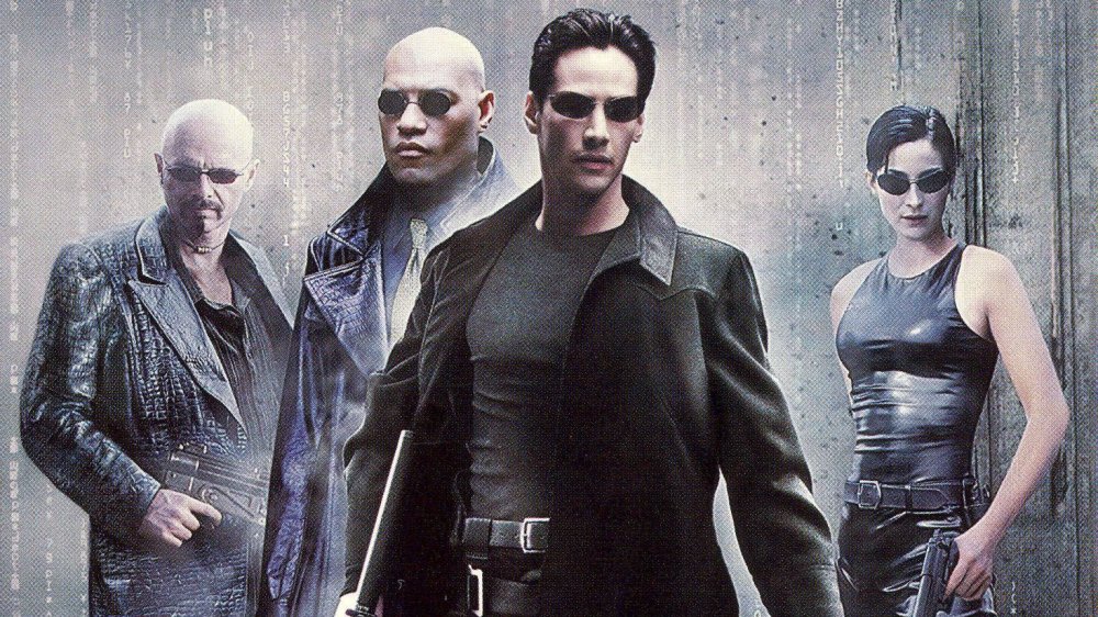 Joe Pantoliano, Lawrence Fishburne, Keanu Reeves, and Carrie-Ann Moss in The Matrix poster