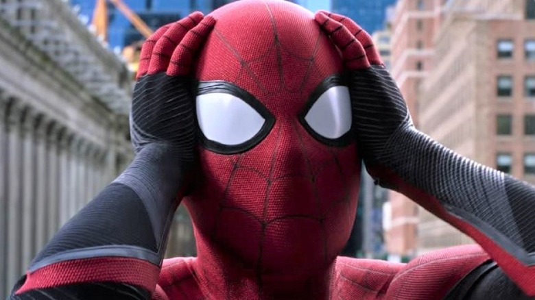 Spider-Man holding head in shock