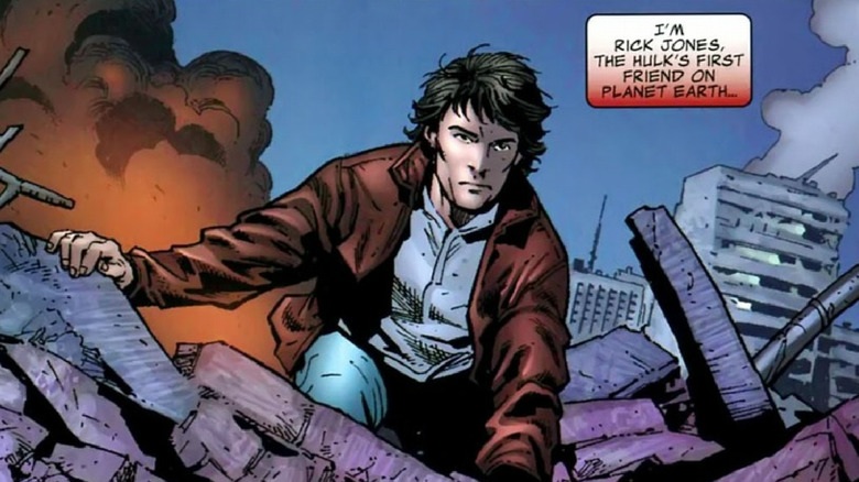 Rick Jones climbing through rubble