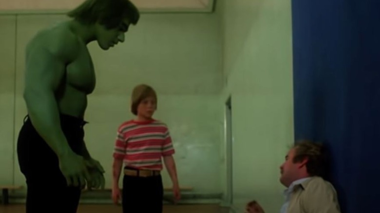 Hulk looming over a man