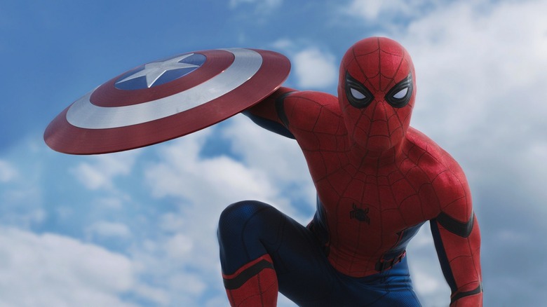 Tom Holland as Spider-Man with Captain America's shield