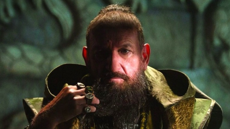 Trevor Slattery strokes beard