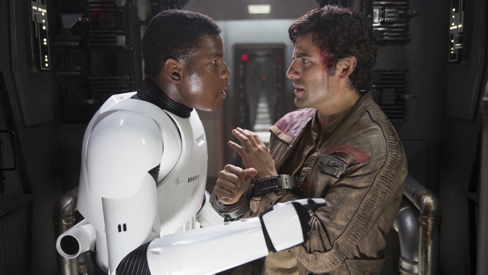 John Boyega and Oscar Isaac as Finn and Poe Dameron Star Wars The Force Awakens