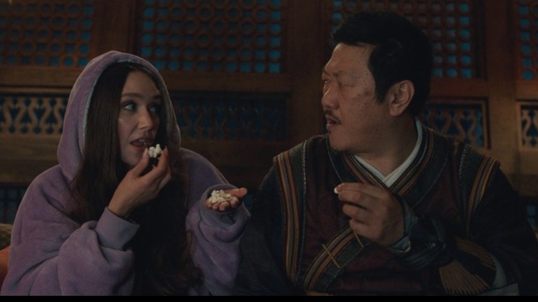 Wong and Madisynn enjoy popcorn