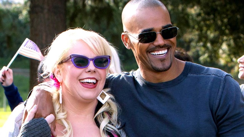 Penelope Garcia and Derek Morgan smiling and celebrating