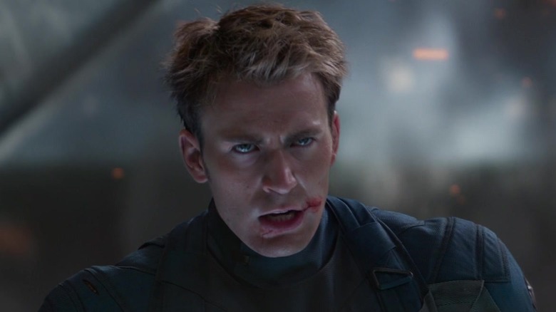 Captain America staring bloodied and bruised