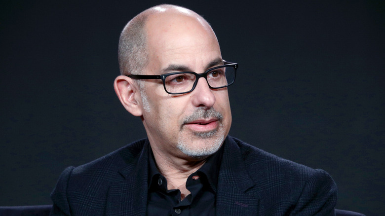 David S. Goyer looking to the right