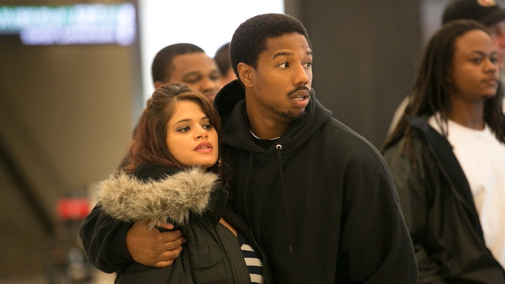 Michael B Jordan holds Melonie Diaz in Fruitvale Station