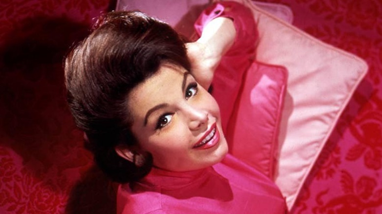 Annette Funicello poses, smiles