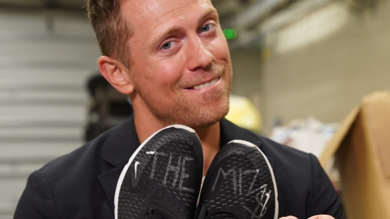 Miz holds up shoes