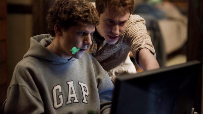 Mark and Dustin at a computer in The Social Network