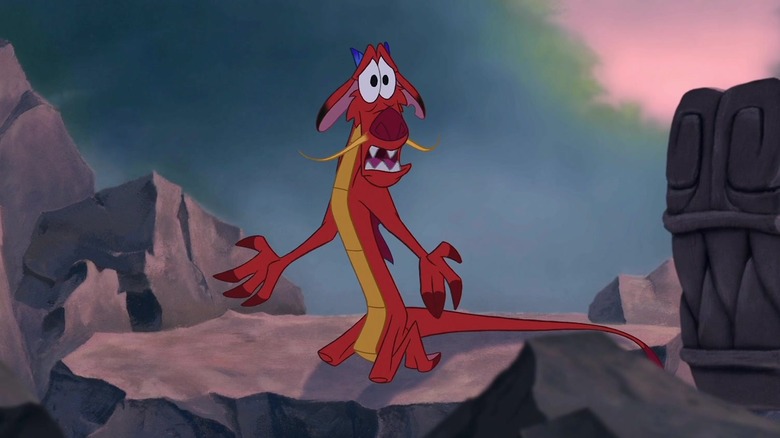 Mushu pleading on stone dragon