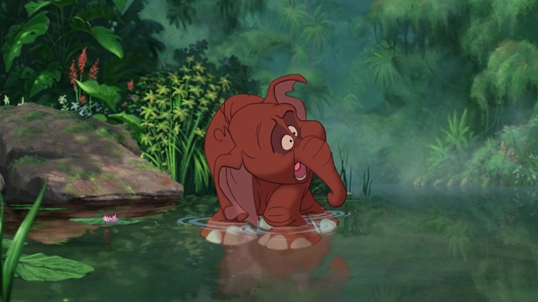 Young Tantor yelling in pond