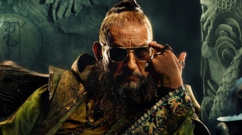 The Mandarin sits contemplatively