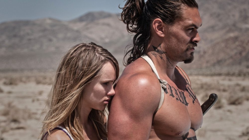 Suki Waterhouse and Jason Momoa in The Bad Batch