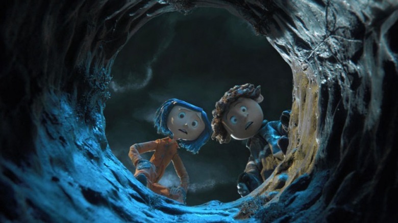 Coraline and Wybie gazing down a well