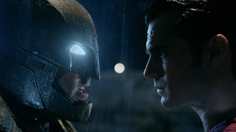 Batman and Superman facing off