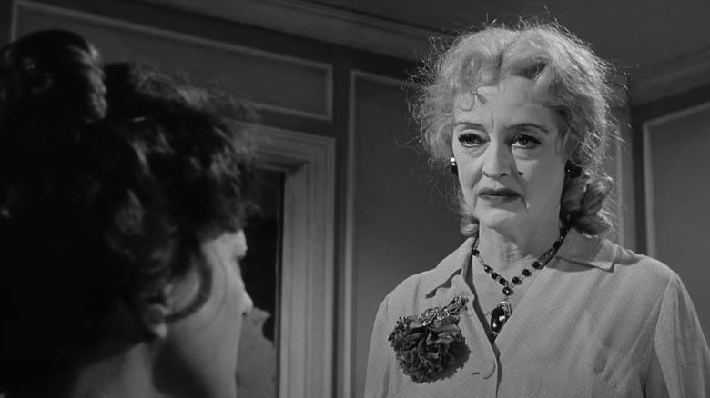 Bette Davis glaring at Joan Crawford