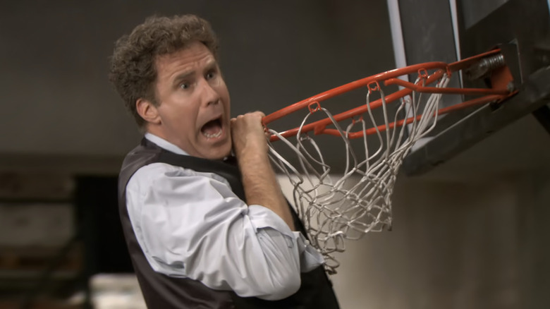 Deangelo Vickers falls with basketball hoop