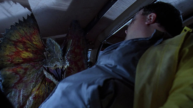 Nedry facing the Dilophosaurus