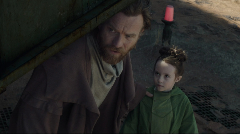 Obi-Wan and Leia hiding in robes