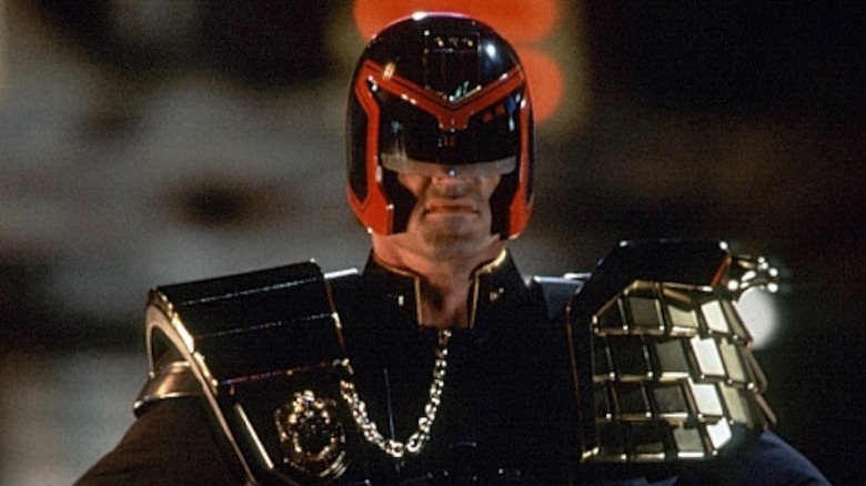 Sylvester Stallone mugging in uniform in Judge Dredd