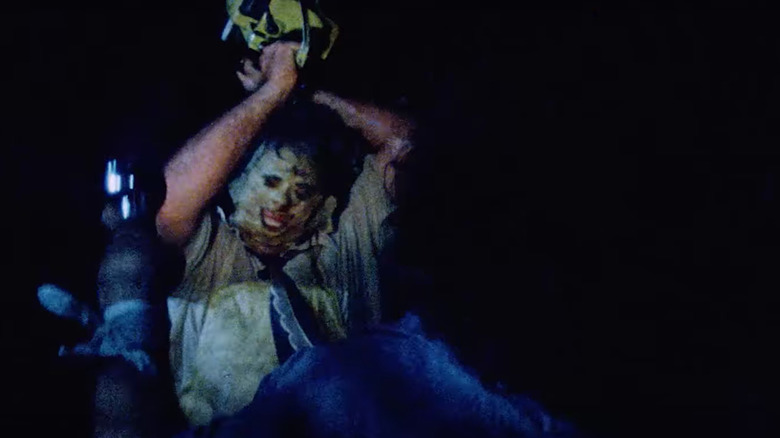 Leatherface attacks with chainsaw