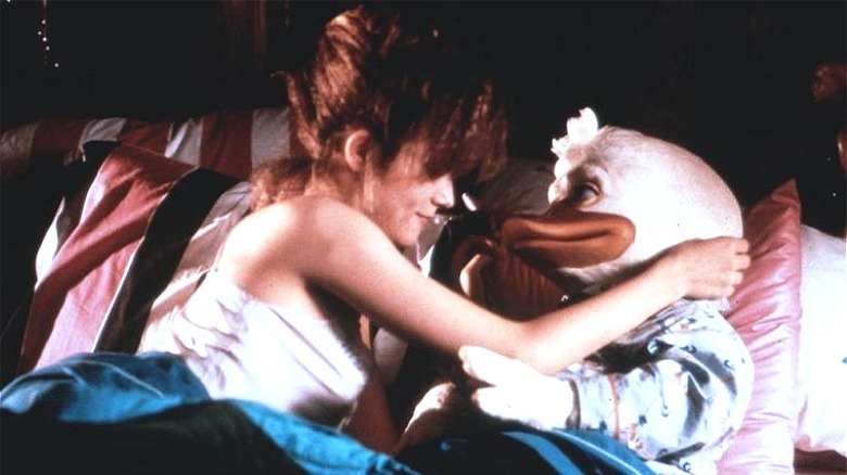 Beverly and Howard the Duck in bed