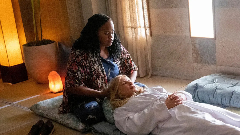 Belinda gives Tanya head massage at the spa