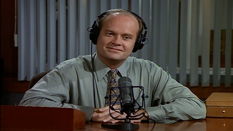 Frasier talking into microphone