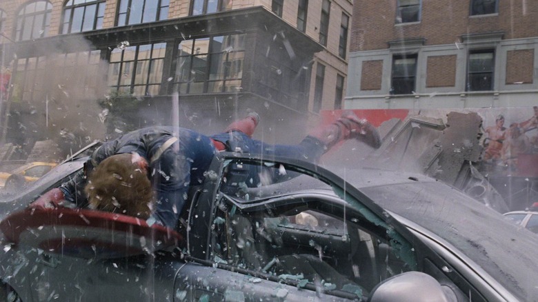 Captain America stunt double Sam Hargrave smashes through a car in The Avengers