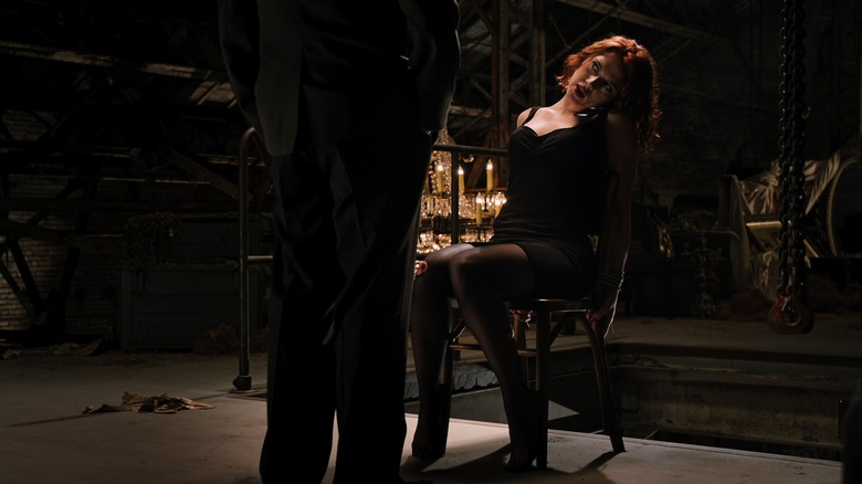 Black Widow on the phone tied to a chair in The Avengers