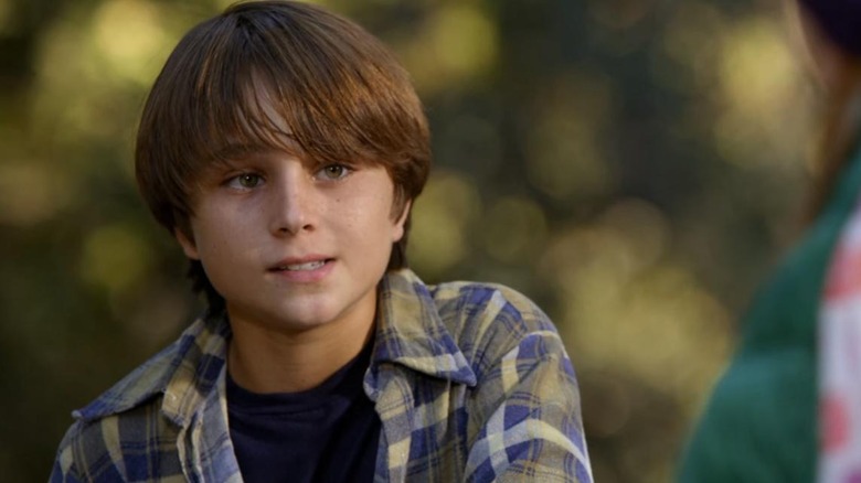 Young boy with plaid shirt