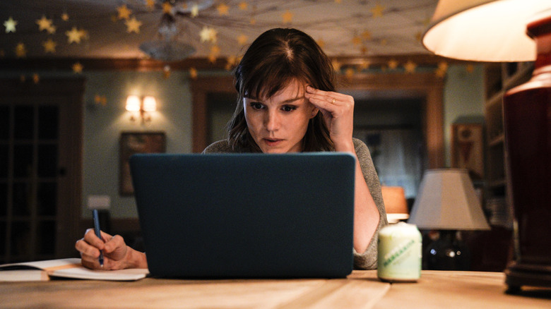 Kristen on laptop